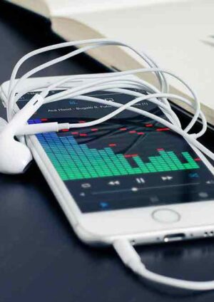 Handsome Man is Using a Laptop, Looking