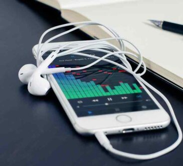 Handsome Man is Using a Laptop, Looking