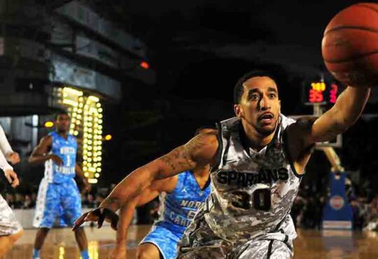 Runner Woman at Start Line on Red Athletic